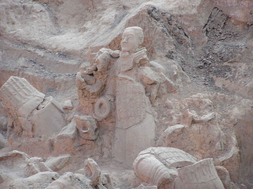 Rows of terracotta warriors in the excavation pit near Xi’an