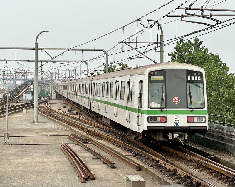 Passengers waiting on an underground platform in a Chinese city