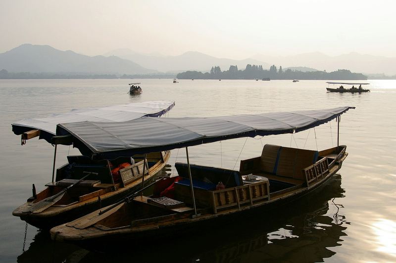 West Lake in Hangzhou with willow trees along the shore